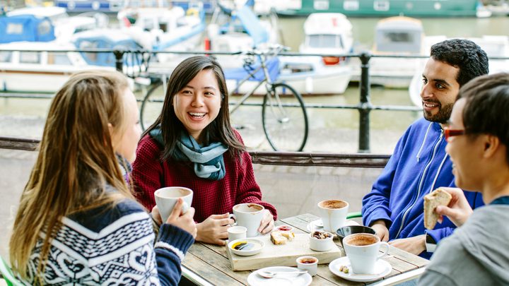 Bristol students have coffee by the docks