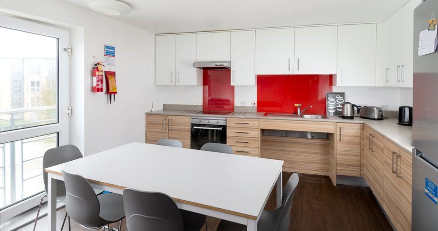 the shared kitchen with table and chairs at wentworth college