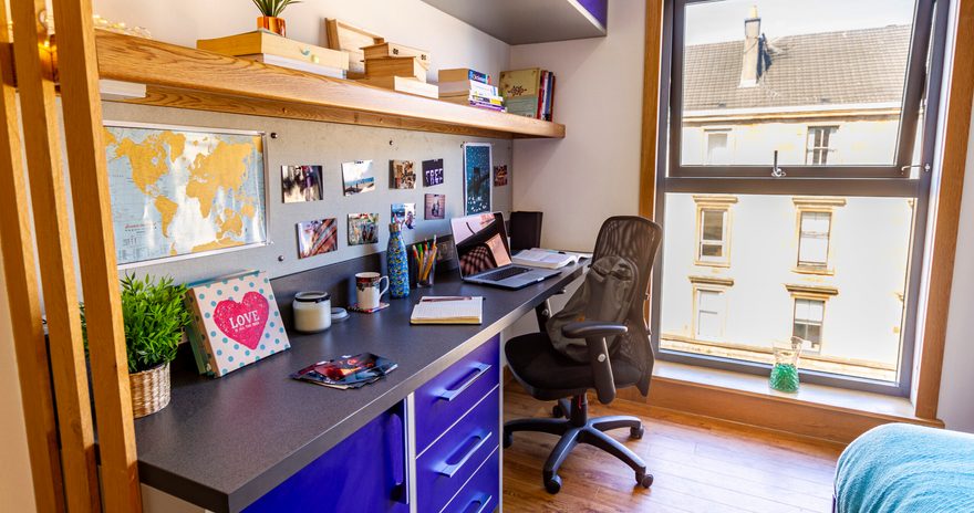 a close up of desk and shelves in the classic ensuite at argyle street