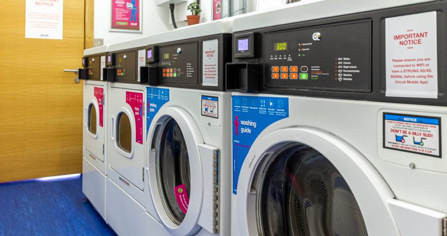 View of laundry machines in Kaplan Living Glasgow Argyle Street