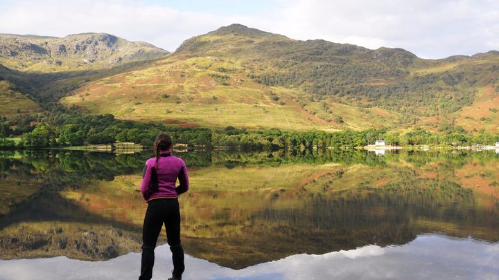 A woman going for a hike in Scotland