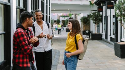 Students laughing out and about in Colchester