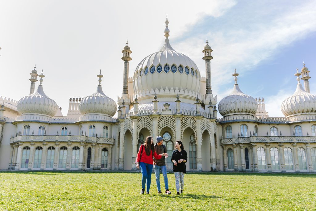 Students having fun near the Pavilion in Brighton