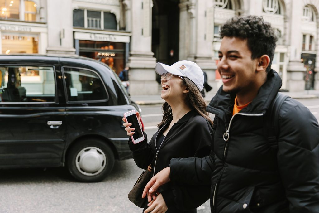 Two students walking around London's city centre