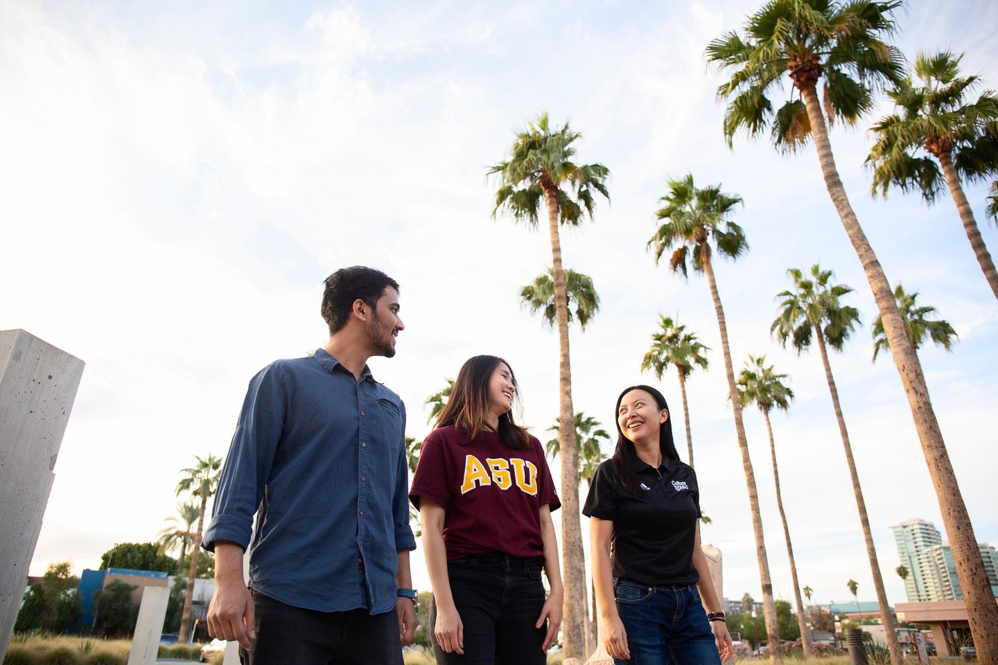 Three students walking around ASU's campu