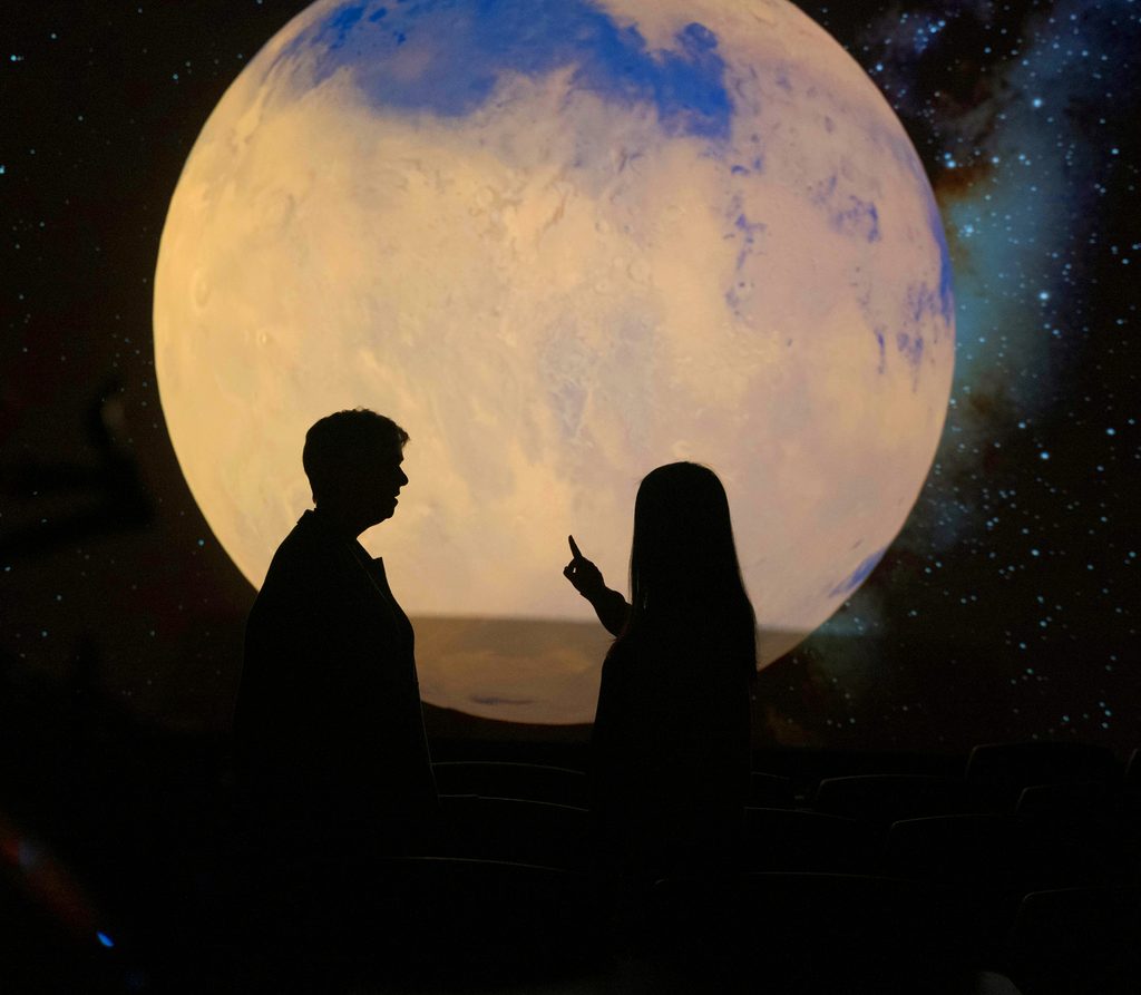 professor and student looking at the moon at the School of Earth and Space Exploration,