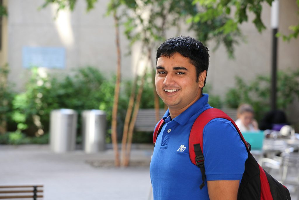 Jecky, a student from India, smiling