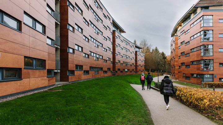 Students walking past accommodation