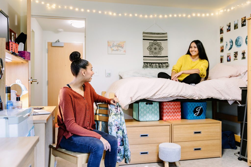 Two students hanging out in their accommodation in a Pace residence