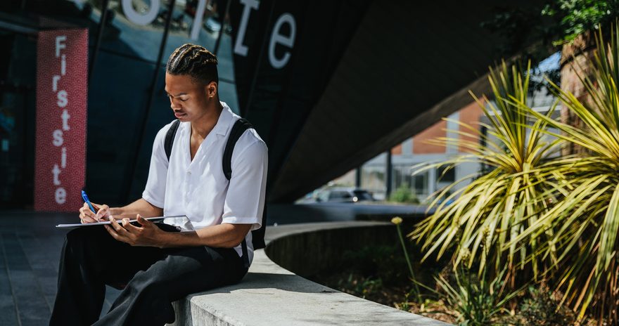 Student studying inside university campus