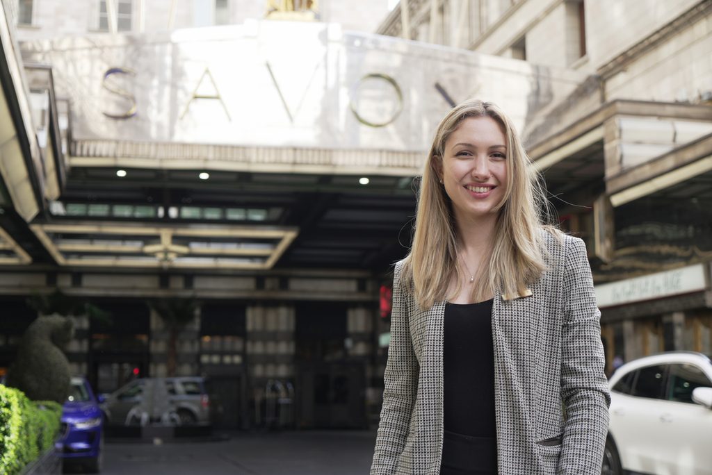 Testimonial from alumni in front of the Savoy London