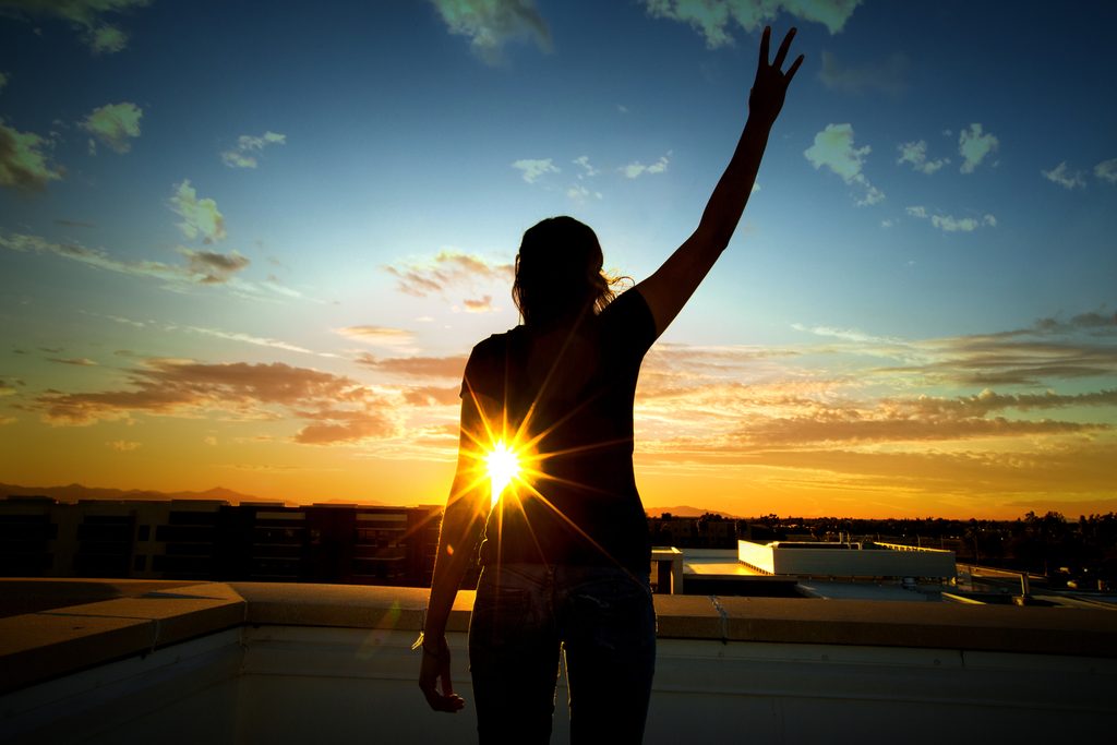 A Arizona State Univesity student at sunset