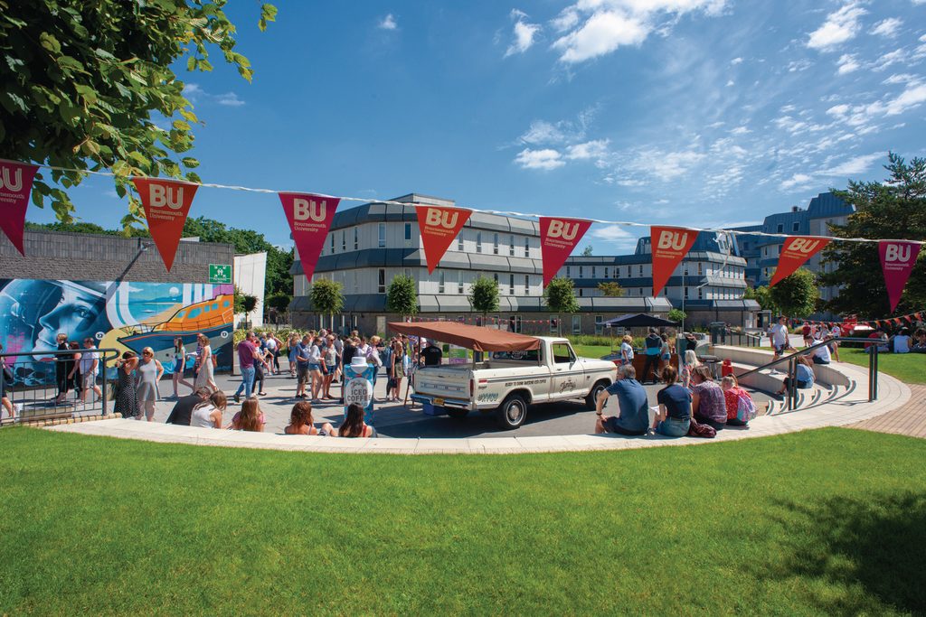 Students at Bournemouth University Talbot campus with open day decoration