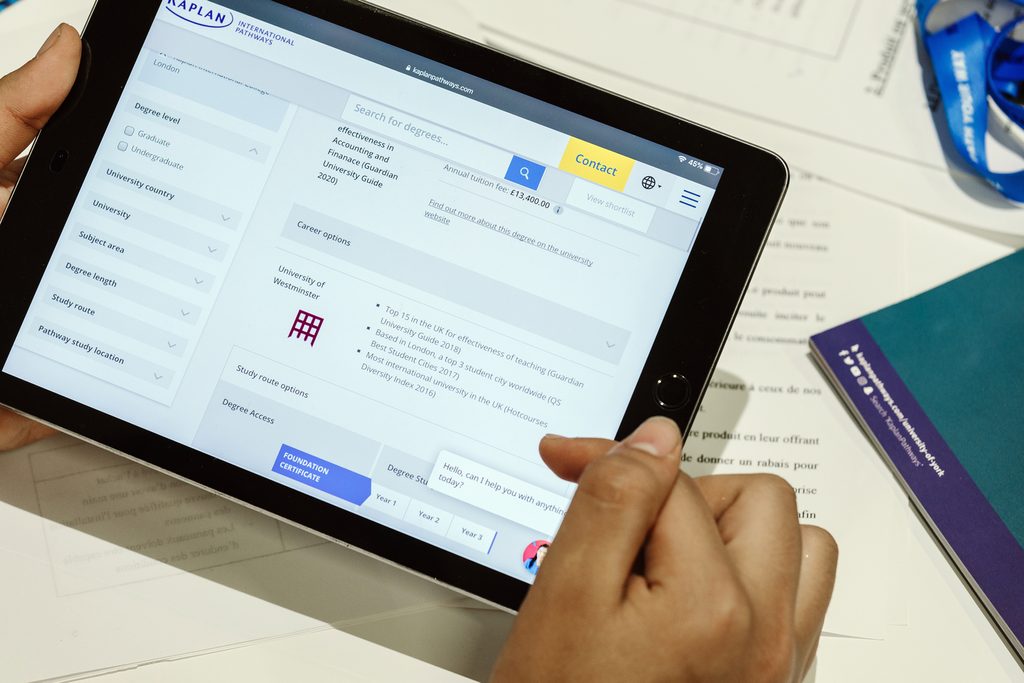 A student using the Kaplan Pathways degree finder on her tablet