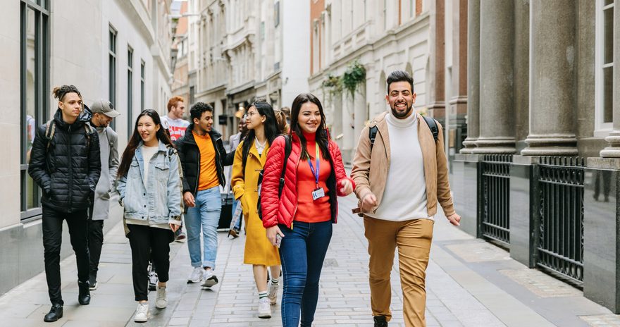 A group of students walking in London