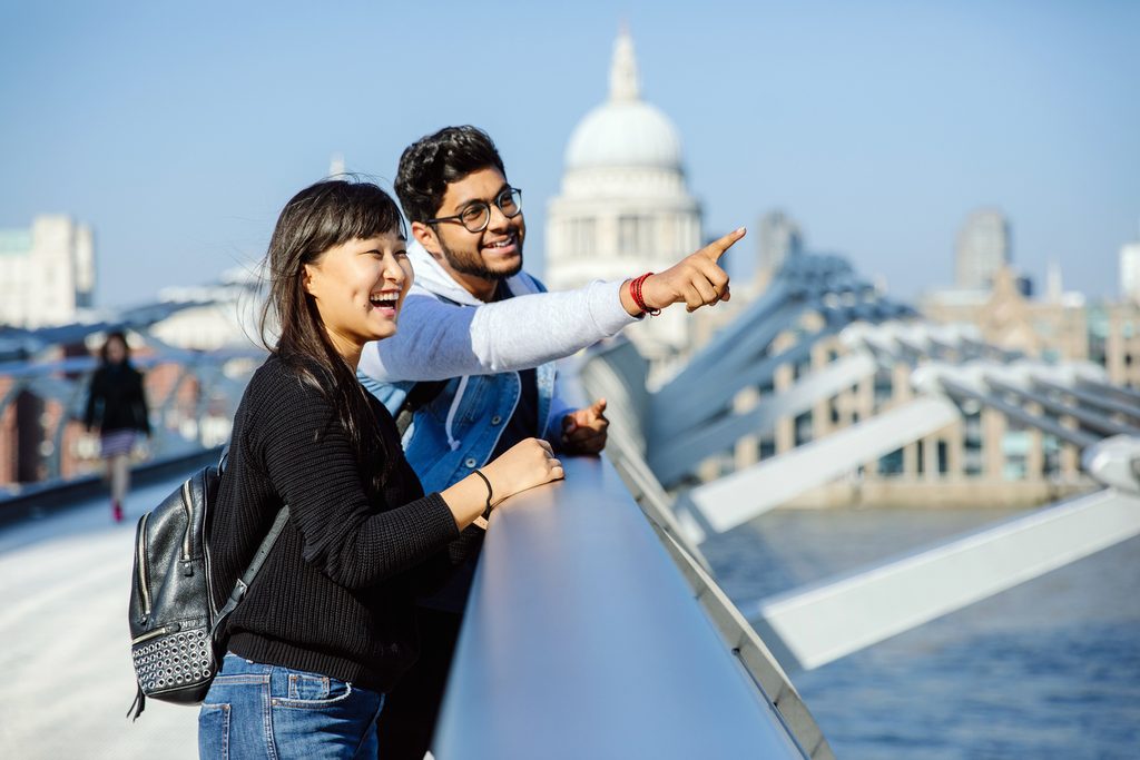 students on Millennium Bridge in London