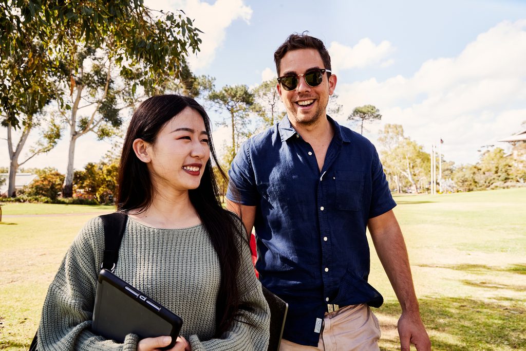 Two Murdoch University students walking