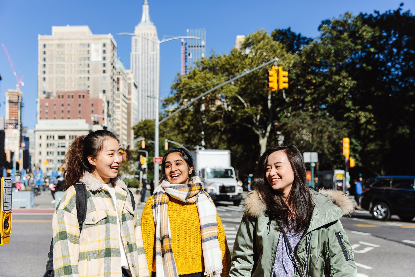 Three Pace University students strolling around new York