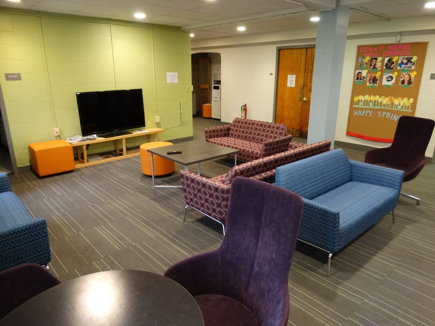 Common area for students with television and furnitures