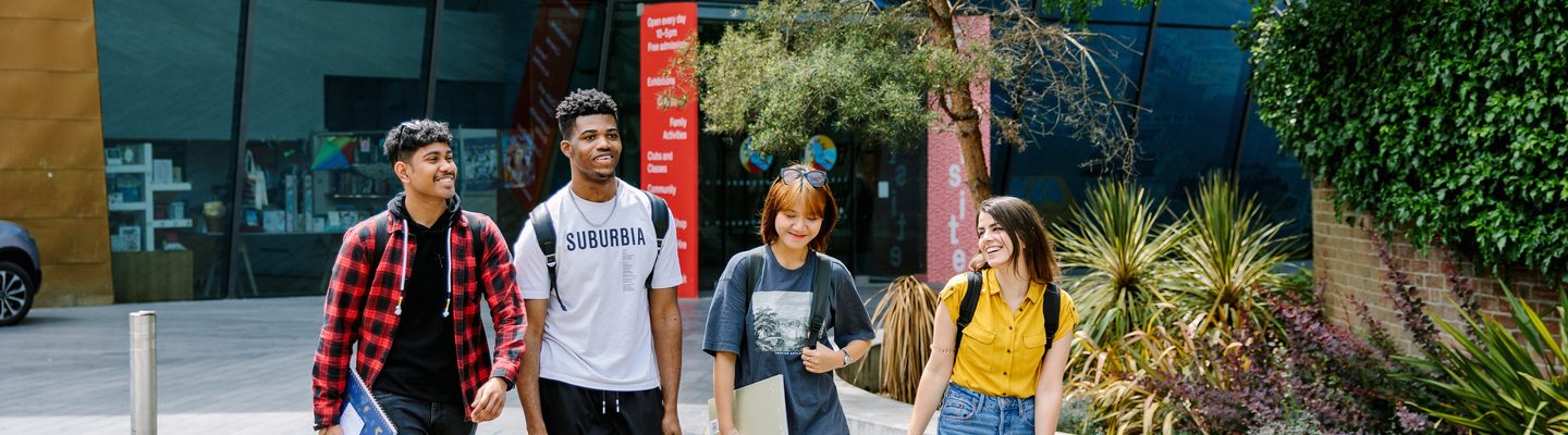 Students walking together inside the university campus