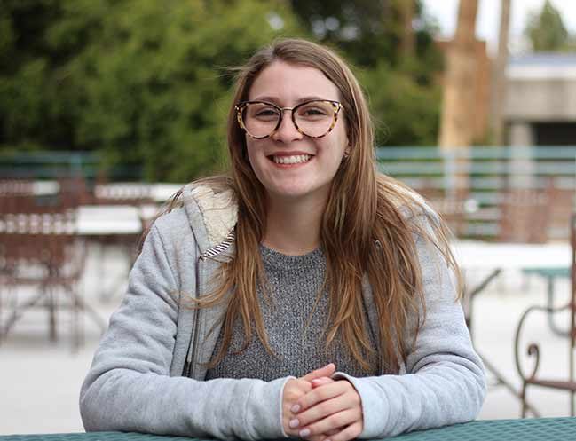 Natalia, a student from Brazil at ASU, smiles