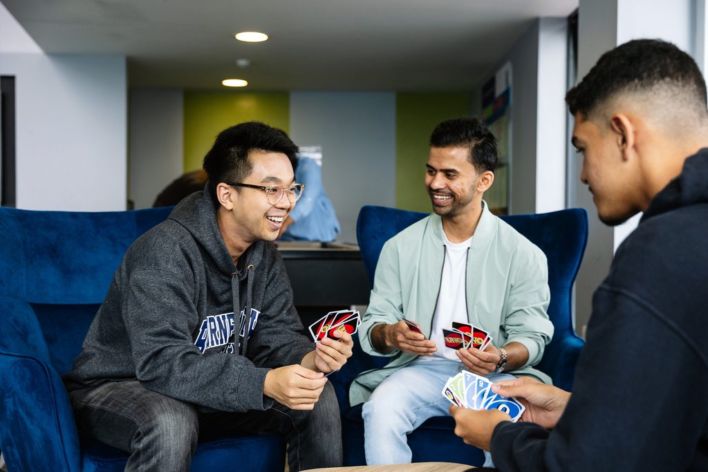 Some Bouremouth International College students playing UNO
