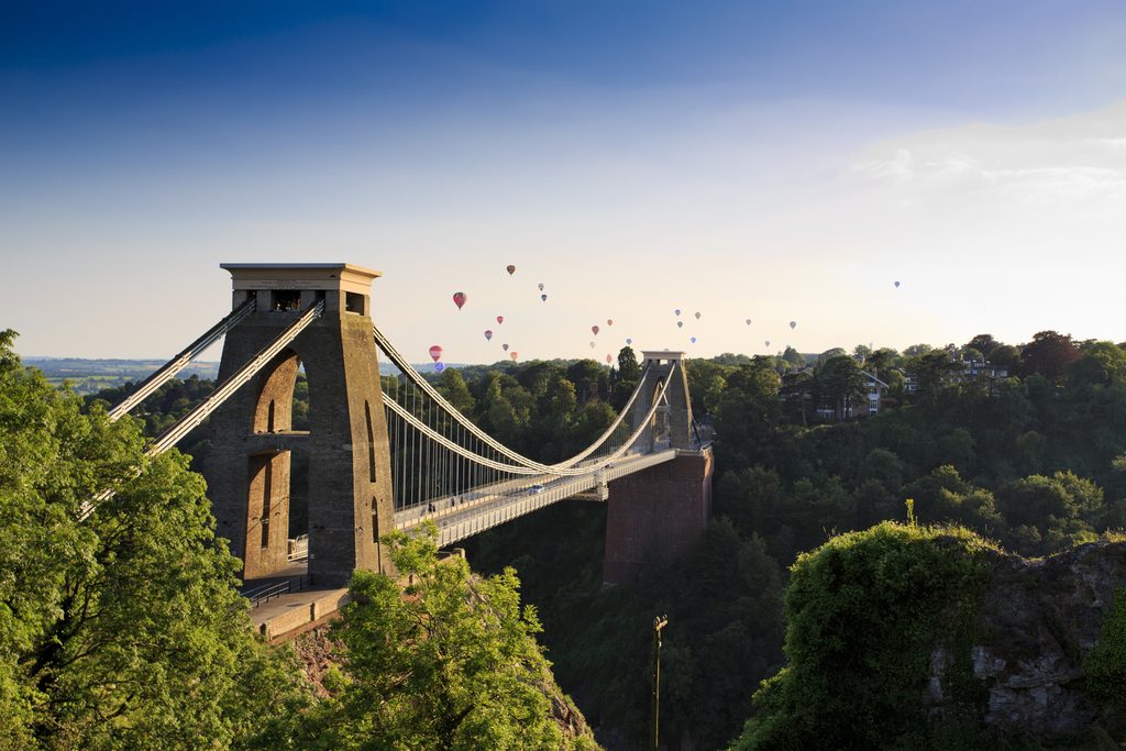 Hot balloons flying over the Bristol Clifton Suspension Bridge