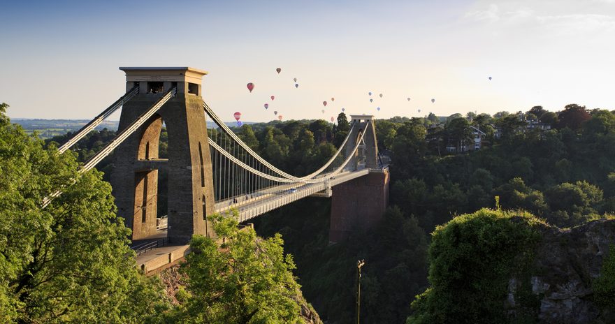 Hot balloons flying over the Bristol Clifton Suspension Bridge