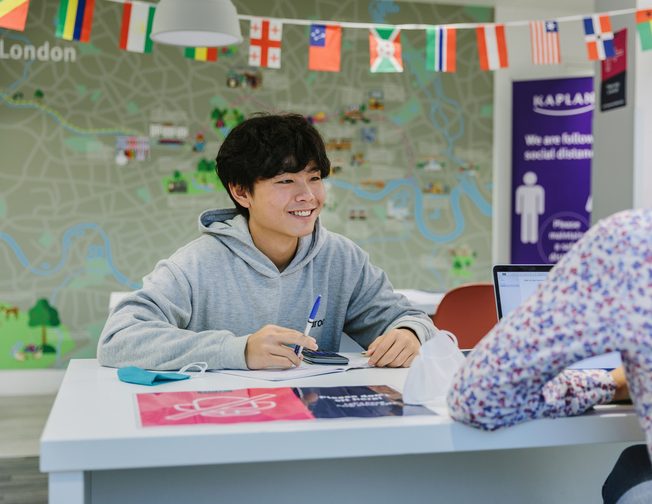 Student with a smiling face at the student services