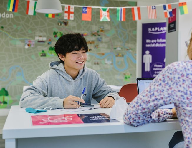 Student with a smiling face at the student services