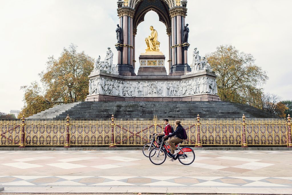 Two students having a city tour on bikes