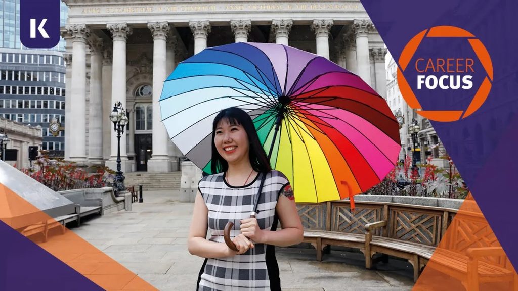 Lucy a student from KICL posing with her umbrella