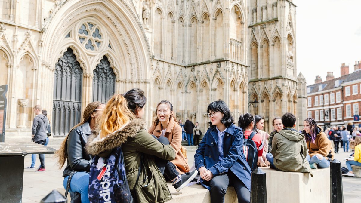 A group of York students hanging in the main town square